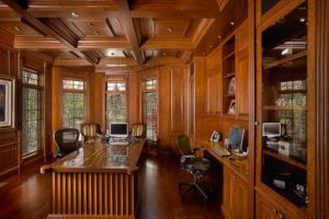 Custom furniture, custom wood ceiling, wood floors, stone insert top of desk