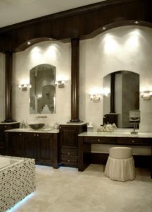 Glass Vessel Sink, Wall sconces, custom mirrors, custom wood cabinets